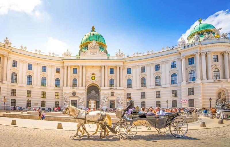 Vienna: Small Group Guided Walking Tour of City Highlights - The historic center walk: small squares and famous streets, explained